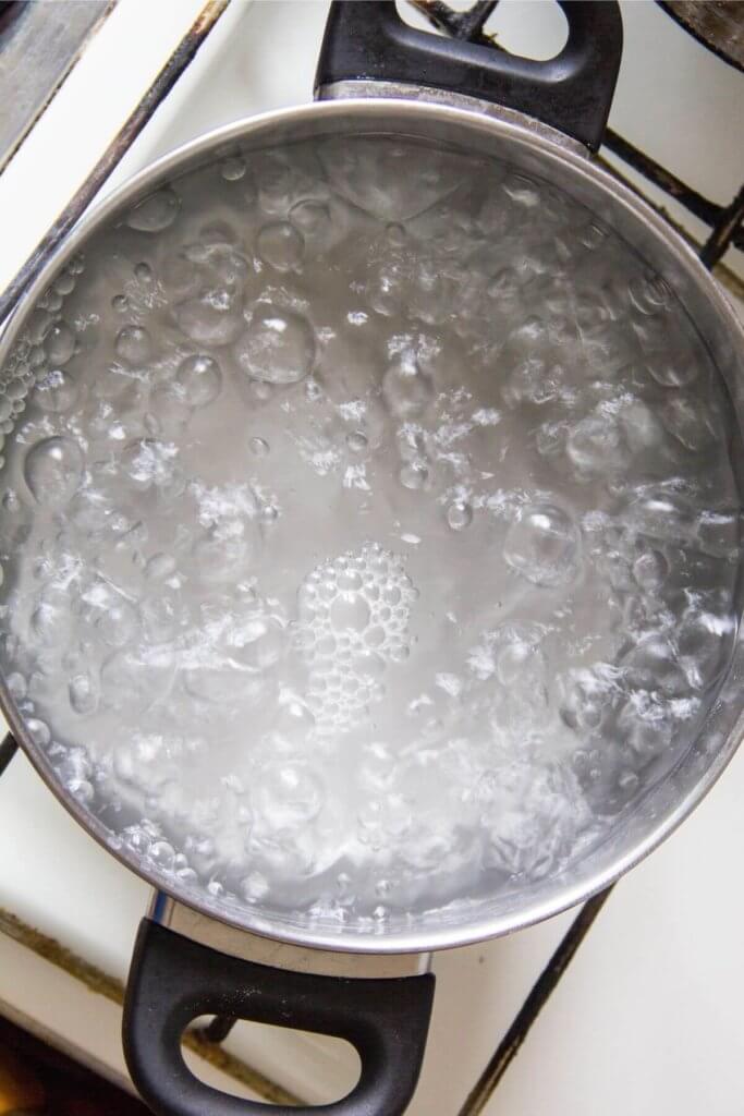 Top view of a pot boiling water