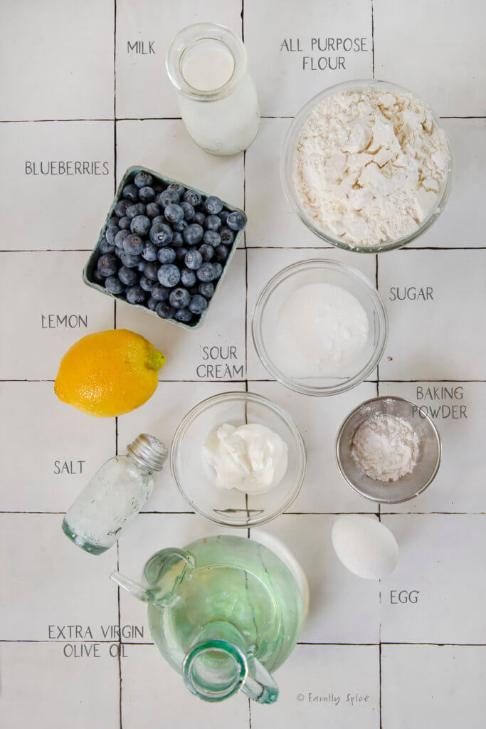 Ingredients labeled and needed to make sour cream scones with blueberries