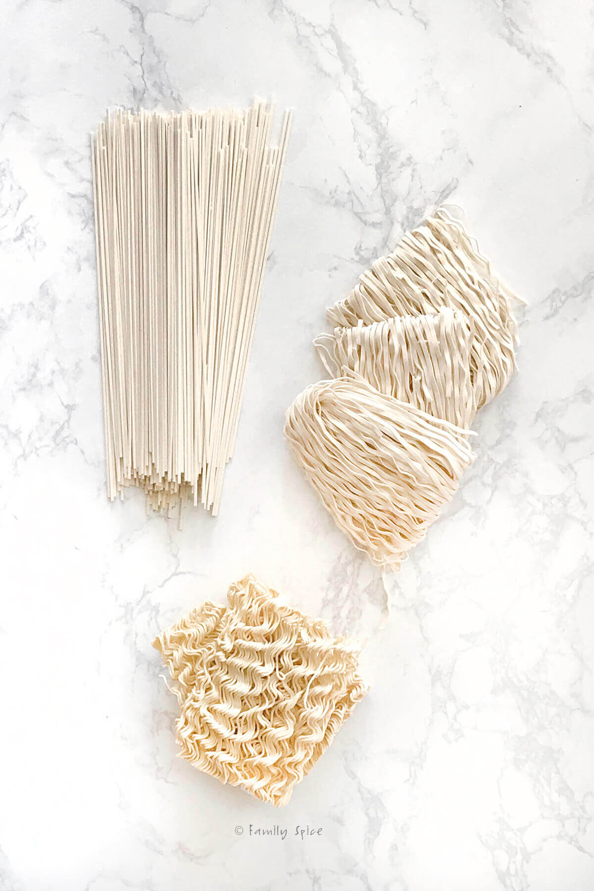 various ramen noodles on a white background