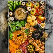 pinterest image for halloween charcuterie board