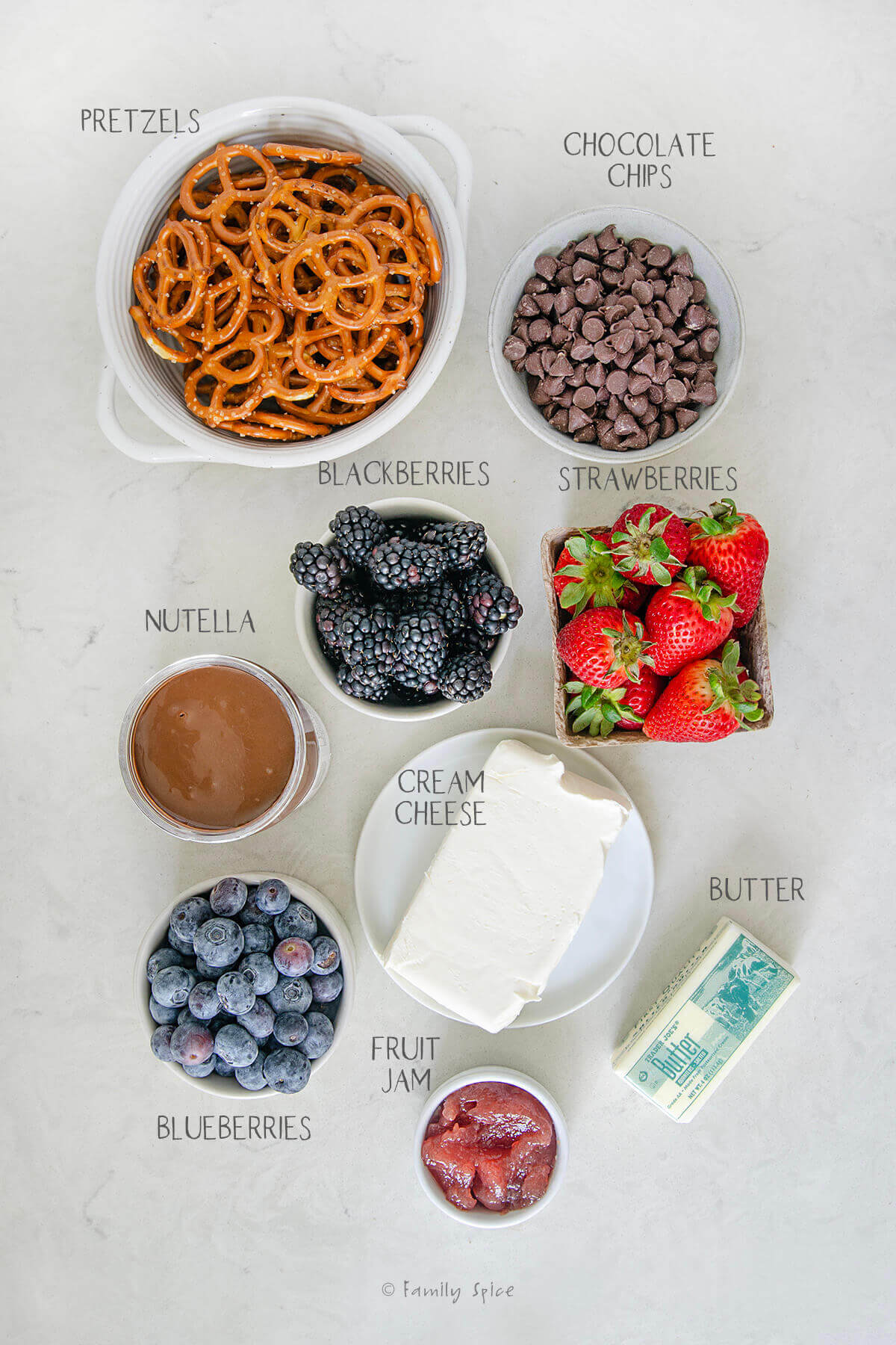 Ingredients labeled and needed to make nutella berry tart.