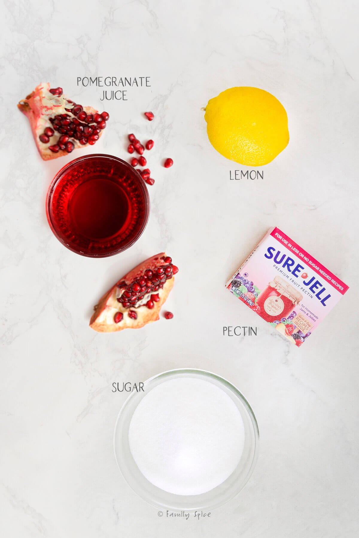 Ingredients labeled and needed to make pomegranate jelly.