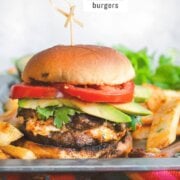 Pinterest image for queso stuffed burgers.