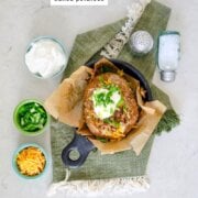 Pinterest image for pulled pork baked potatoes.