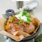 Pinterest image for pulled pork baked potatoes.