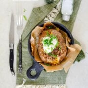 Pinterest image for pulled pork baked potatoes.