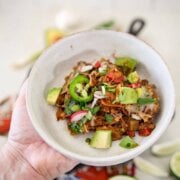 Pinterest image for pulled pork enchilada skillet.