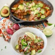 Pinterest image for pulled pork enchilada skillet.