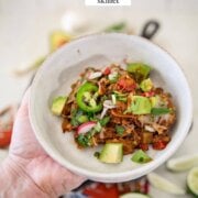 Pinterest image for pulled pork enchilada skillet.
