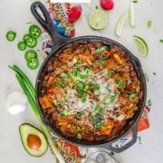 Pinterest image for pulled pork enchilada skillet.