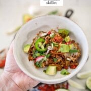 Pinterest image for pulled pork enchilada skillet.