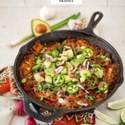 Pinterest image for pulled pork enchilada skillet.