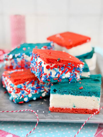 Close up of a tray with red, white and blue ice cream sandwiches using a box mix hack.