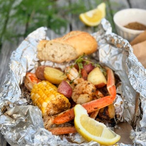 A seafood boil dinner cooked into a foil packet.