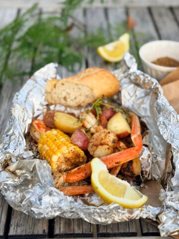 A seafood boil dinner cooked into a foil packet.