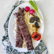 Pinterest image for oven baked sheet pan koobideh kabob.
